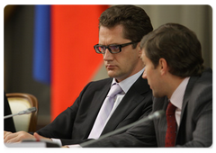 Kirill Androsov and Andrei Dementyev at a meeting on drafting a federal law On the Principles of Government Regulation of Commercial Activity in the Russian Federation, chaired by Prime Minister Vladimir Putin