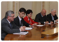 Margaret Chan, Director General of the World Health Organisation, with Russian Prime Minister Vladimir Putin