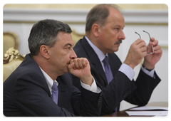 Andrei Akimov and Vladimir Dmitriyev (left to right) during the meeting on the tentative basic parameters of the budget for 2010 and the planning period of 2011-2012, and principles of budget expenditure