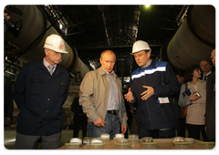 Prime Minister Vladimir Putin inspecting an alumina facility at Basel Cement’s Pikalyovo Alumina Refinery