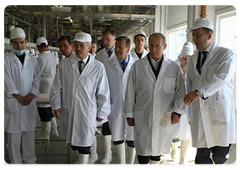Prime Minister Vladimir Putin touring the Korocha meat processing plant
