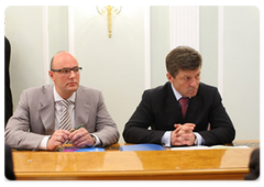 President of the Sochi 2014 Organising Committee Dmitry Chernyshenko and Deputy Prime Minister Dmitry Kozak at the meeting on the progress of work undertaken by Olympstroi