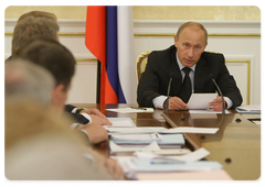 Prime Minister Vladimir Putin chairing a meeting on economic problems