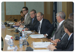 Prime Minister Vladimir Putin chairing a meeting on the banking system