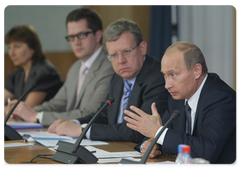 Prime Minister Vladimir Putin chairing a meeting on the banking system