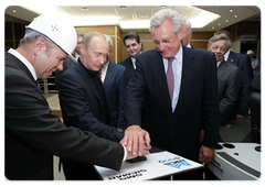 Prime Minister Vladimir Putin at a hot rolling mill