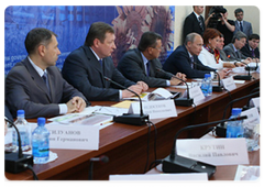 Prime Minister Vladimir Putin holding a meeting on the preparations for and the start of the grain harvesting season in 2009