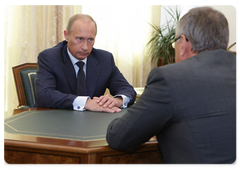 Prime Minister Vladimir Putin during a meeting with Andrei Kostin, head of Vneshtorgbank (VTB)