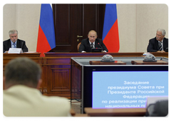 Prime Minister Vladimir Putin chairing a Presidium meeting of the Presidential Council for the Implementation of Priority National Projects and Demographic Policy