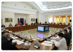 Prime Minister Vladimir Putin chairing a Presidium meeting of the Presidential Council for the Implementation of Priority National Projects and Demographic Policy