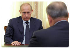 Prime Minister Vladimir Putin during a meeting with Chairman of Vnesheconombank Vladimir Dmitriyev