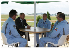 Prime Minister Vladimir Putin meeting with the Russian Knights aerobatic team during his visit to the MAKS-2009 Air Show