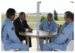 Prime Minister Vladimir Putin meeting with the Russian Knights aerobatic team during his visit to the MAKS-2009 Air Show
