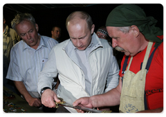 Prime Minister Vladimir Putin visited the ethnographic village of Taltsy on the banks of the Angara River, where he viewed handmade iron crafts by Lake Baikal area’s blacksmiths