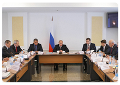 Prime Minister Vladimir Putin during a meeting on relief efforts following the accident at the Sayano-Shushenskaya hydropower plant