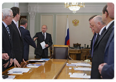 Prime Minister Vladimir Putin chairing a meeting on restructuring the missile and space industry
