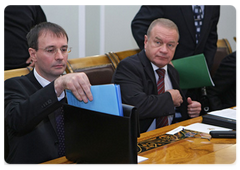 Director General and Chief Designer of the Russian Institute of Space Device Engineering Yury Urlichich and President of the Korolev Rocket and Space Corporation Energia Vitaly Lopota