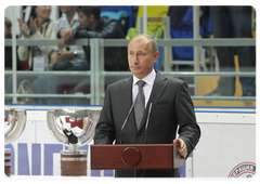 Prime Minister Vladimir Putin conferring state decorations on members of the Russian ice hockey team