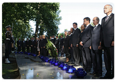 Prime Minister Vladimir Putin taking part in a memorial ceremony at the Tomb of the Defenders of the Coast in the Westerplatte Memorial