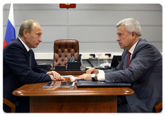 Prime Minister Vladimir Putin in meeting with LUKoil president Vagit Alekperov