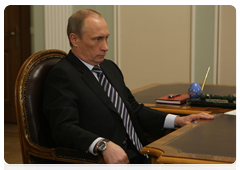 Председатель Правительства Российской Федерации В.В.Путин встретился с главной Внешторгбанка А.Л.Костиным