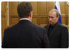 Prime Minister Vladimir Putin with Voronezh Governor Alexei Gordeyev