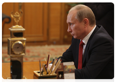 Prime Minister Vladimir Putin during a meeting with Natural Resources and Environment Minister Yuri Trutnev
