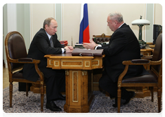 Prime Minister Vladimir Putin holds a meeting with Vladimir Grodetsky, director general of Izhevsk Machine-Building Factory