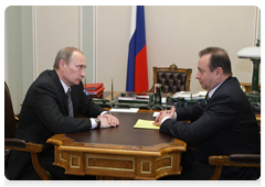 Prime Minister Vladimir Putin holding a working meeting with Vladimir Strzhalkovsky, director general and chairman of the board of Norilsk Nickel