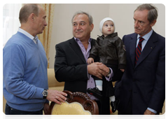 Prime Minister Vladimir Putin in the village of Nekrasovskoye, near Sochi, where people are being rehoused who have been displaced from the Imereti Valley to make way for the 2014 Olympic facilities