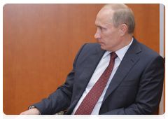 Prime Minister Vladimir Putin meeting with Formula One CEO Bernie Ecclestone