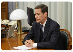 Deputy Prime Minister Alexander Zhukov at a meeting with Prime Minister Vladimir Putin