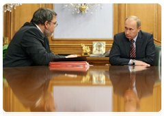 Prime Minister Vladimir Putin meeting with Minister of Communications and Mass Media Igor Shchegolev and Head of the Antimonopoly Service Igor Artemyev