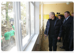 Prime Minister Vladimir Putin talking to residents of flood-hit Novomikhailovsky in the Krasnodar Territory