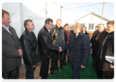Prime Minister Vladimir Putin meeting with the leaders of the construction companies that have rebuilt the village of Verkhnyaya Vereya