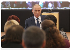 Prime Minister Vladimir Putin holding a video conference with heads of the regions affected by wildfires in the village of Verkhnyaya Vereya