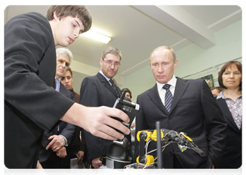 Prime Minister Vladimir Putin visiting Moscow school No. 1060 and examining educational innovations