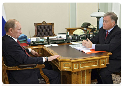 Prime Minister Vladimir Putin at a meeting with head of the Russian Railways Vladimir Yakunin