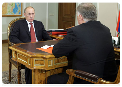Prime Minister Vladimir Putin at a meeting with head of the Russian Railways Vladimir Yakunin