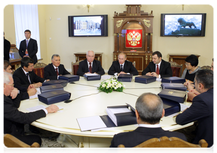 Prime Minister Vladimir Putin attending a limited attendance meeting of CIS delegation heads