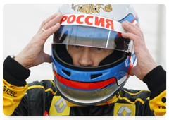 Prime Minister Vladimir Putin at the wheel of a Formula One race car