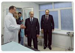 Prime Minister Vladimir Putin visiting a regional hospital during a working trip to Ivanovo