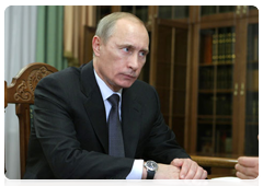 Prime Minister Vladimir Putin holding a working meeting with Governor of the Ivanovo Region Mikhail Men
