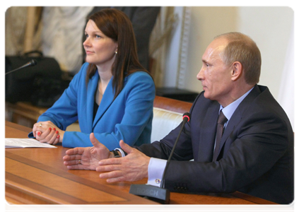 Russian Prime Minister Vladimir Putin and Finnish Prime Minister Mari Kiviniemi holding news  conference after talks