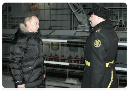 Prime Minister Vladimir Putin visiting the Sevmash shipbuilding company and taking a look at the nuclear submarine Alexander Nevsky
