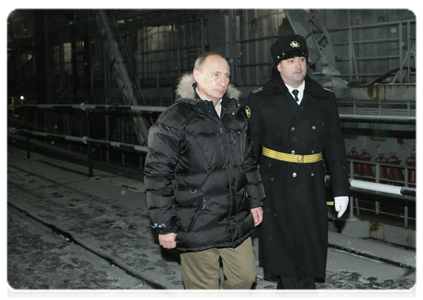 Prime Minister Vladimir Putin visiting the Sevmash shipbuilding company and taking a look at the nuclear submarine Alexander Nevsky
