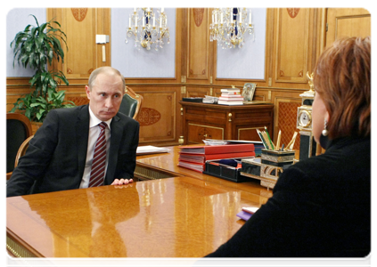 Prime Minister Vladimir Putin at a meeting with Agriculture Minister Yelena Skrynnik