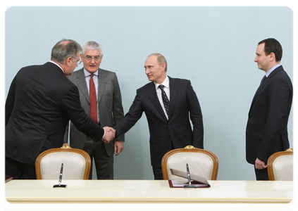 General Electric, Russian Technologies and Inter RAO UES signing a framework agreement to set up joint ventures to manufacture high-tech energy and medical equipment in Russia, Prime Minister Vladimir Putin attending