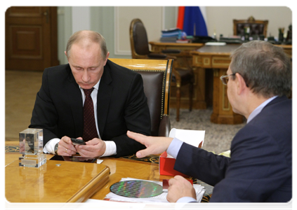 Prime Minister Putin during a working meeting with Deputy Prime Minister Sergei Ivanov and AFK Sistema Chairman of the Board Vladimir Yevtushenkov