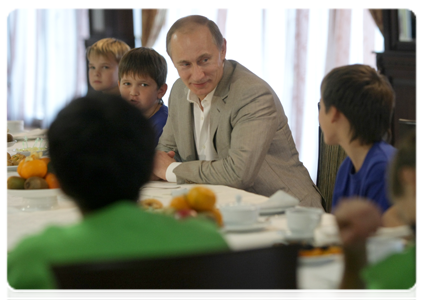 Prime Minister Vladimir Putin meeting with boys from the football team Zhemchuzhina during his visit to the Yug Sport training ground in Sochi